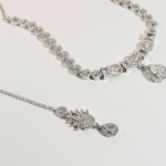 Plated Cubic Zirconia Studded Teardrop & Halo Design Luxe Statement Necklace Set in Silver Tone for Women