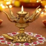 Brass Curved Metal Flower Candle Holder On Tortoise